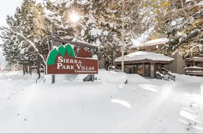 a sign for a park in the snow at Sierra Park Villas 28 in Mammoth Lakes