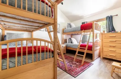 a bunk bed room with two bunk beds at Winterset 4 in Mammoth Lakes