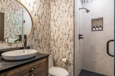 a bathroom with a sink and a shower at Timbers 1057 in Mammoth Lakes