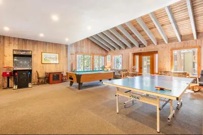 a large room with a ping pong table in it at Viewpoint 151 in Mammoth Lakes