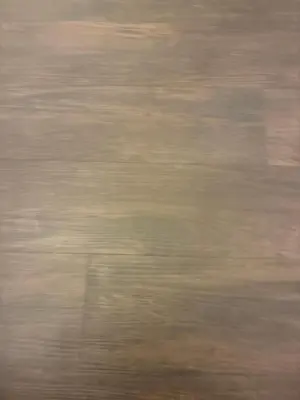 a close up view of a wooden floor with a blurry at Rudy Fernandez in Gravesboro