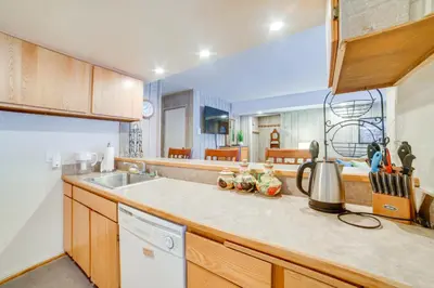 a kitchen with a sink and a counter top at 1 Mi to Village and Eagle Lodge Condo with Fireplace in Mammoth Lakes