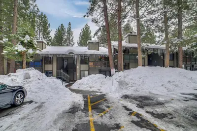 a pile of snow in front of a building at 1 Mi to Village and Eagle Lodge Condo with Fireplace in Mammoth Lakes