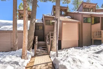 a house in the snow with trees at Northstar Nest in Truckee