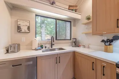 a kitchen with a sink and a window at Northstar Nest in Truckee