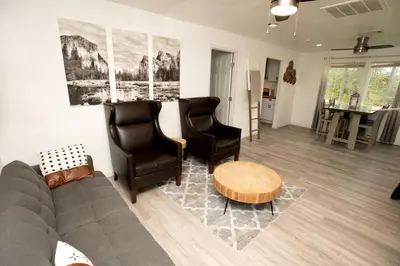 a living room with a couch and two chairs at Cozy Nature-Filled Home with Garden & Night Sky Views Near Yosemite Tioga Pass, Groveland CA in Groveland