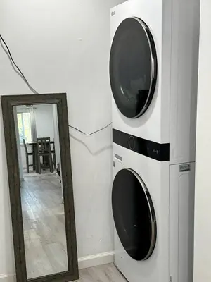 a mirror next to a wall with two microwaves at Cozy Nature-Filled Home with Garden & Night Sky Views Near Yosemite Tioga Pass, Groveland CA in Groveland