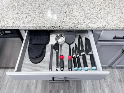a drawer in a kitchen counter with utensils at Beautiful 2 bedroom 2 bathroom house in North Highlands