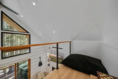 a room with a bed and a window at Donner Summit - Hot Tub, Fireplace & Mountain Views in Soda Springs