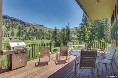 a deck with chairs and a table and a grill at The Meadows-Cozy Hotel Room Deck in Kirkwood