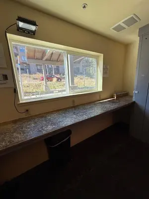 a window in an empty room with a counter and a counter at The Meadows- Charmed Hotel Unit Steps to Ski Lifts in Kirkwood