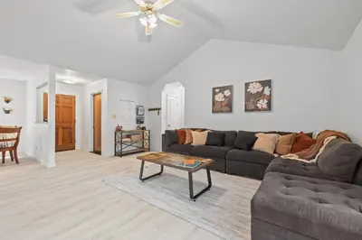 a living room with a couch and a table at Game Room, 8 guests- Lake, Yosemite, Sonora nearby in Groveland