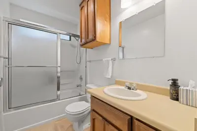 a bathroom with a sink and a toilet and a shower at Game Room, 8 guests- Lake, Yosemite, Sonora nearby in Groveland
