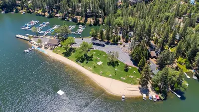 an aerial view of a island in the water with boats at Game Room, 8 guests- Lake, Yosemite, Sonora nearby in Groveland