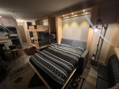 a bedroom with a large bed in a room at Kirkwood Studio SKI IN Walk out in Kirkwood