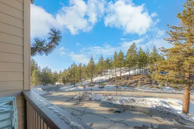 a winter view from a balcony with snow on the ground at Tramway Loft Cozy Stay for 4 in Stateline