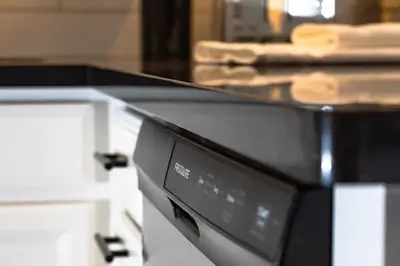 a close up of a black microwave oven at Ski in or Walk to lifts hot tub covered parking in Kirkwood