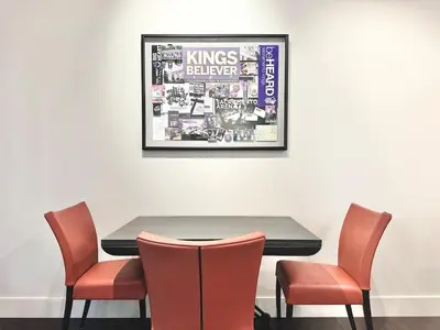 a table with four chairs and a picture on the wall at Modern 2 Bedroom by Midtown Walk Distance to Bars and Restaurants in Sacramento