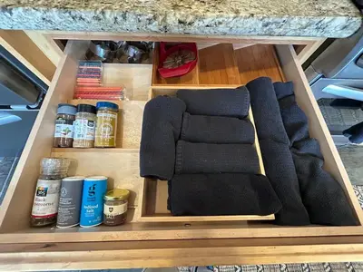 a drawer in a kitchen with towels and spices at Kirkwood Resort between Village & Timber Creek in Markleeville