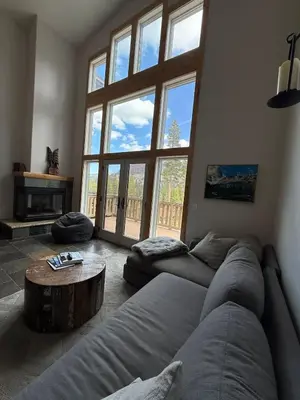 a living room with a couch and a coffee table at Kirkwood Resort between Village & Timber Creek in Markleeville