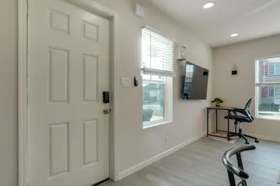 an office with a white door and a desk at Great for Digital Nomads! Convenient Manteca Apt in Manteca