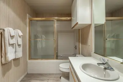 a bathroom with a sink and a toilet at Bridges 3 in Mammoth Lakes