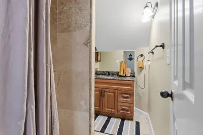 a bathroom with a shower and a sink at Magnificent stay at fair oaks village in Fair Oaks