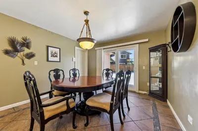 a dining room with a table and chairs at 2253 Catalina Drive home in South Lake Tahoe