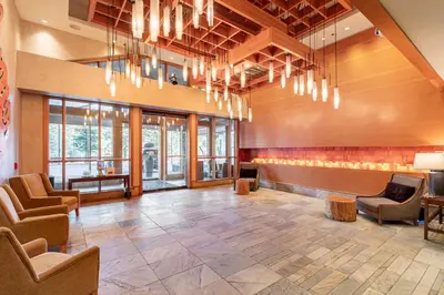 a large lobby with chairs and a waiting room at Mammoth Monache Resort in Mammoth Lakes
