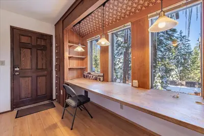 a home office with a wooden desk and a window at Dollar Point - Observation Dr, home in Tahoe City