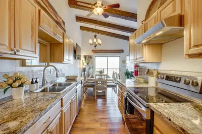 a large kitchen with wooden cabinets and a sink at Modern Heavenly Ski Resort Mountain-Top Retreat in Stateline