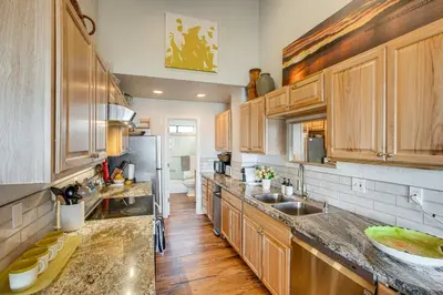 a large kitchen with wooden cabinets and a sink at Modern Heavenly Ski Resort Mountain-Top Retreat in Stateline