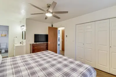 a bedroom with a bed and a ceiling fan at Less Than 1 Mi to Twain Harte Lake Forest-View Retreat! in Twain Harte