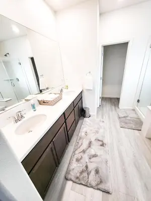 a bathroom with a sink and a mirror at Vip Class Two in Lodi
