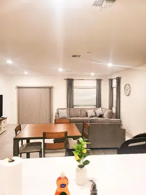a living room with a couch and a table at Vip Class Two in Lodi