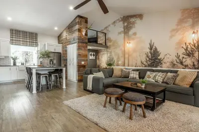 a living room with a couch and a table at Luxury Helios Retreat by the Village- Apres Ready in Mammoth Lakes