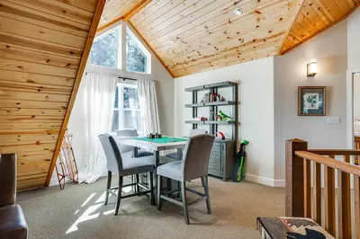 a dining room with a table and chairs at Game Room and Hot Tub! Dog-Friendly Arnold Retreat in Arnold
