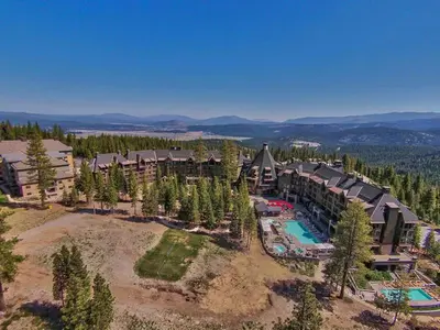an aerial view of a resort with a pool at Northstar Ritz-Carlton in Truckee