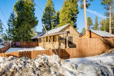 a house under construction in the snow at Close to Lake and Heavenly Mtn Resort! Quaint Cabin in South Lake Tahoe