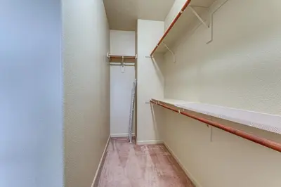 a walk in closet with a walk in shower at Sophisticated Sanctuary 8 Mi to Lodi Wineries! in Stockton