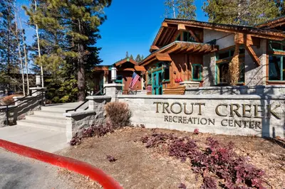 a sign for front creek recreation center in front of a building at Alder Creek Paradise Tree-lined Cabin Stay for 7 in Truckee