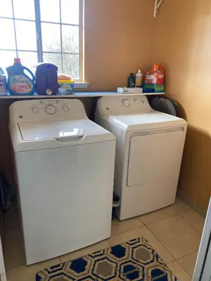 a laundry room with a washer and a dryer at St Annas House in Squaw Valley