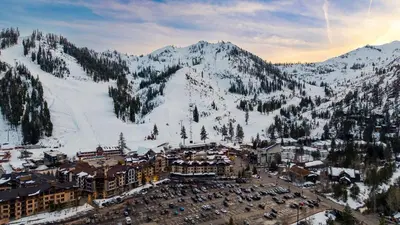 an aerial view of a ski resort in the snow at The Traverse by AvantStay Ski-InSki-Out Condo • Pool Hot Tub Access • Steps to KT-22 in Olympic Valley