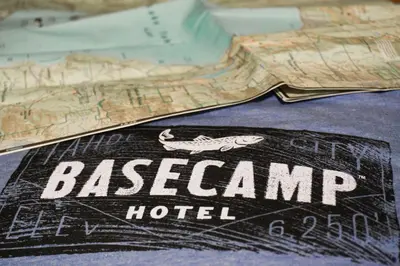 a close up of a map and a bagacist hotel sign at Basecamp Tahoe City in Tahoe City