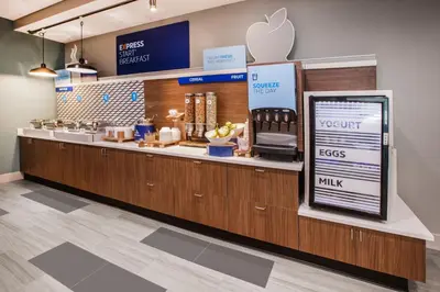 an apple store with a counter with an appleasteryasteryasteryasteryasteryasteryastery at Holiday Inn Express & Suites Jackson by IHG in Jackson