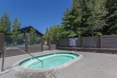 a small pool in a yard with a fence at Snowcreek #881 - Phase V in Mammoth Lakes