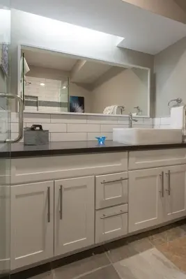 a bathroom with a sink and a large mirror at Snowcreek #881 - Phase V in Mammoth Lakes