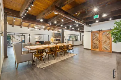 a large dining room with a long table and chairs at Yosemite Lakes Cabin & Cottages in Harden Flat