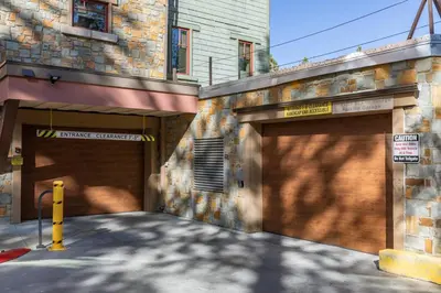 a pair of garage doors on a building at Village Treehouse #2 in Mammoth Lakes