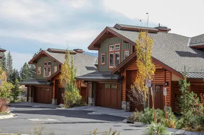 a log home with a garage at Juniper Crest 6 Apartment in Mammoth Lakes
